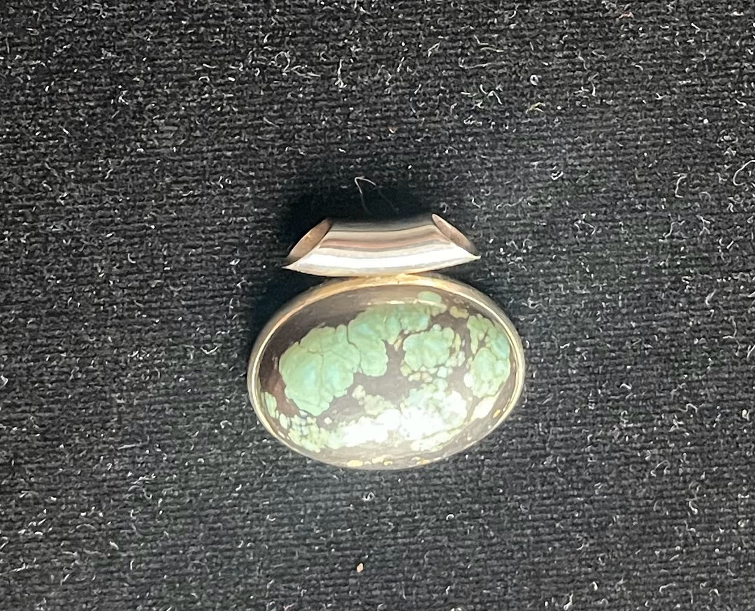 Ovaal met zilveren rand 25x18mm Turkoois 8, 07 gram €30,-