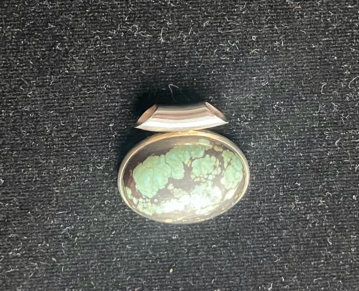 Ovaal met zilveren rand 25x18mm Turkoois 8, 07 gram €30,-