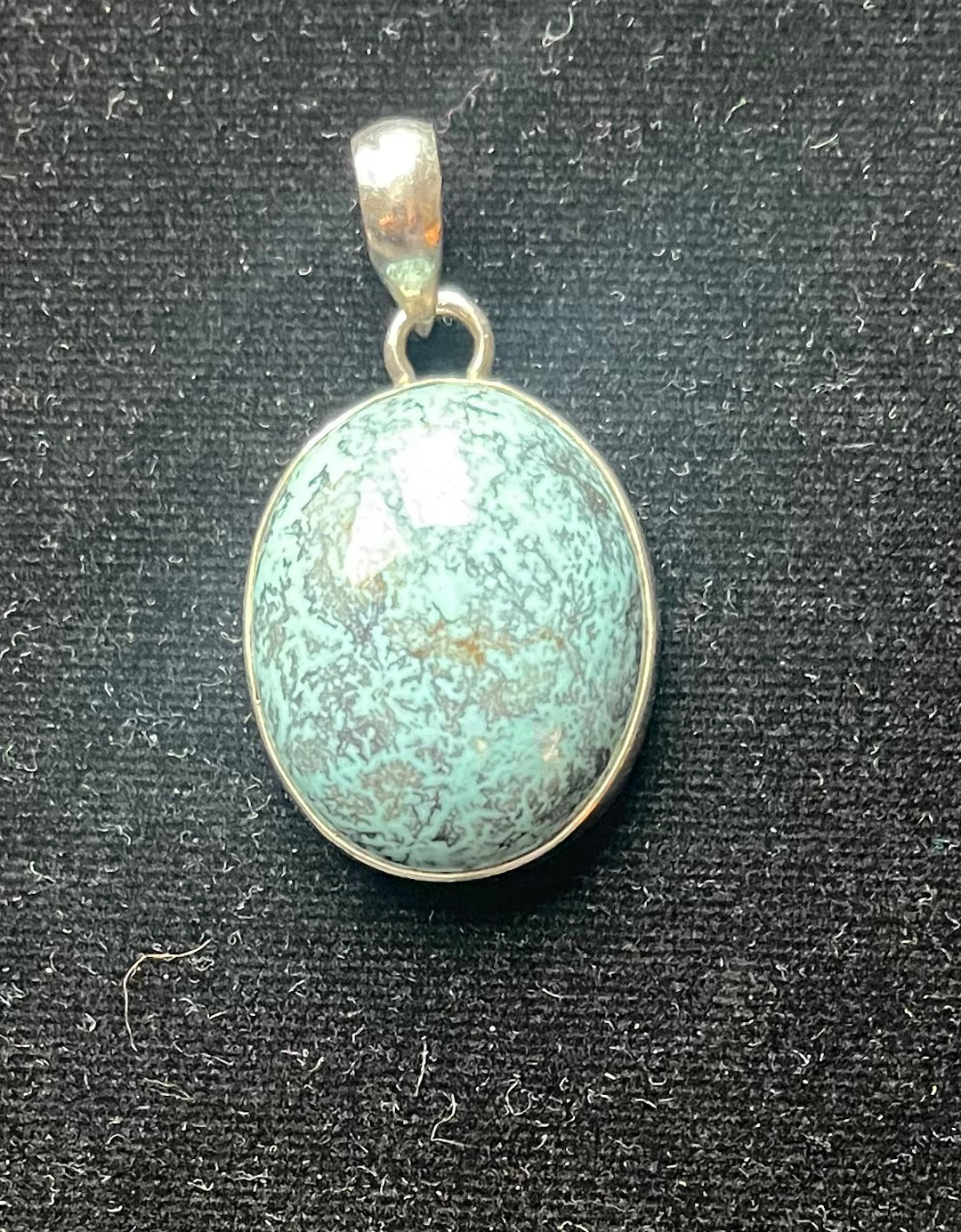 Fijn getekende Turkoois.25x23 mm ovaal 7,43gram €25,-