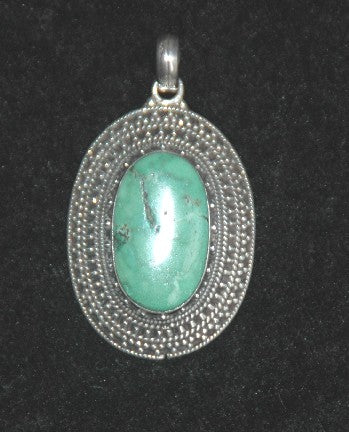 Oval turkoois met brede zilveren rand
