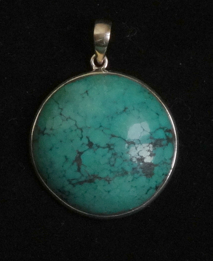 Mooie grote Turkoois gevat in zilver.